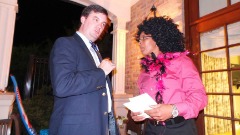 Patrick Walsh is shown speaking with Women's Basketball Hall of Fame Inductee Teresa Weatherspoon during a past Wiggin' Out Gala.
